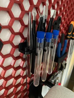 Custom holder for honeycomb storage wall system (HSW)