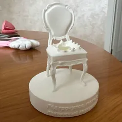 A miniature chair from the movie "12 Chairs"