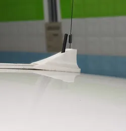 Shark fin antenna housing