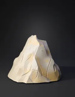 faceted mountain rock sculpture gray with yellow speckles stone text