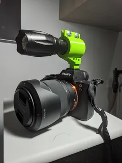 Hot shoe torch mount for camera