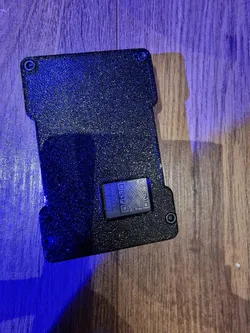 Pop-up credit card wallet spreader with Tile Slim holder