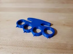 Knuckle duster with spikes