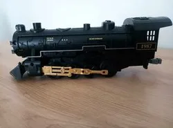 The wheel of a toy steam locomotive