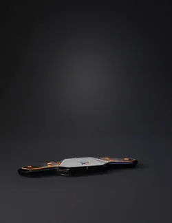 balance trainer with circular base and foldable arms black with orang
