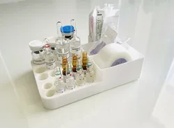 Medicine vial/ampoule holder