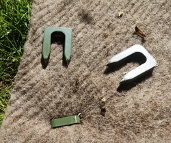 Pins for holding agrotextile, ground anchors for garden needs