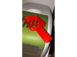 pelle pour litière chat