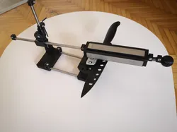 Knife/Scissors Sharpening Jig with Revolving Stones