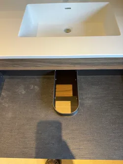 Sink drawer waste cutout fence.