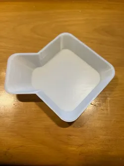 Parts sorting tray with corner scoop