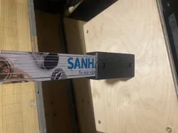 Nástěnný držák na dřevěný metr/wall holder for a wooden tape measure