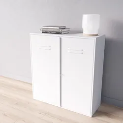 IKEA set with white IVAR Cabinet with doors books and milk glass table lamp