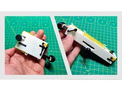 a “SPY” Folding Rubber Bands Gun