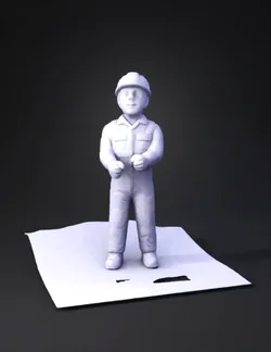 orange safety worker figurine with hard hat and reflective stripes on