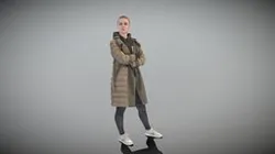 Standing young woman in puffer jacket 406