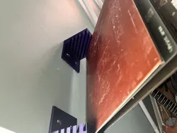 Wall mounted printbed holder