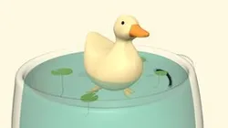 Cute duck with swimming in tiny cup