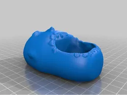 Wierd face plant pot
