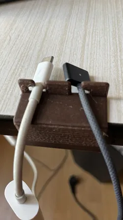 Table cable handler