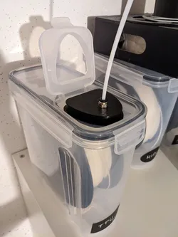 Cereal container filament drybox PTFE cap