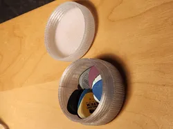 Guitar pick box with wheezer lick