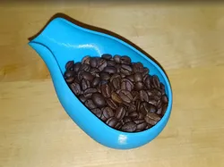 Coffee bean dosing tray