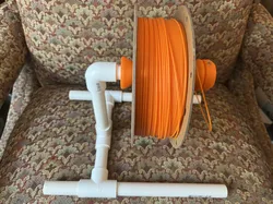 Filament holder/stand with a printed roller and 1/2" PVC pipe frame