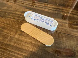 Band-aid shaped Bandage Storage Box with Sliding Lid