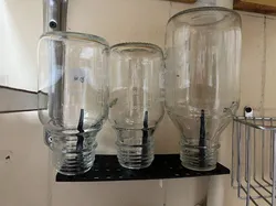 Bottle drying shelf with three pins and holes