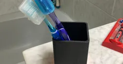 Tooth brush holder stand cup