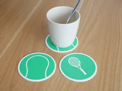 Double sided tennis coaster