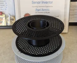 Bambu Labs filament spool reduced to print in an A1 Mini
