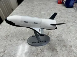 Smaller X-37B with opening PL bay doors
