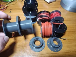 Mini cable spools and stackable spools for loose wires to prevent a mess