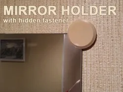 Mirror holder with hidden fastener