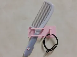 Soporte de pared para peines y gomas para el cabello - Modelo de impresión 3D gratuito