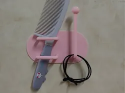 Soporte de pared para peines y gomas para el cabello - Modelo de impresión 3D gratuito