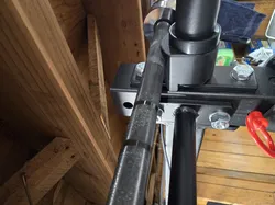 Barbell rest for weight plate peg