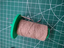 String dispenser with cutter