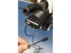 Support to attach a webcam to a microscope
