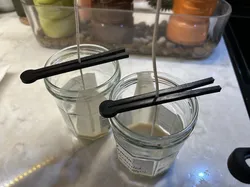 Candle wick clip