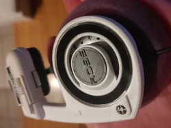 Koss Porta Pro Headband: circular disks with Koss letters
