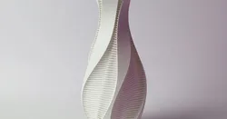 Twisted vase with strands
