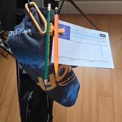 Golf scorecard and pencil holder with clip