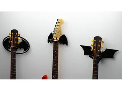 Support mural mécanisé pour guitare