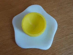 Egg shaped egg holder