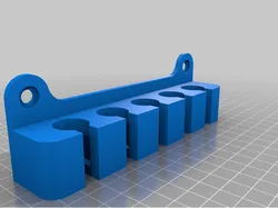 Pegboard gun cleaning rod holder