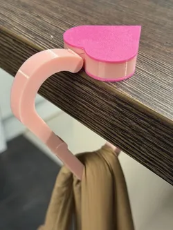 Heart-shaped bag hanger