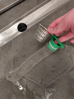Shower drain lint filter holder